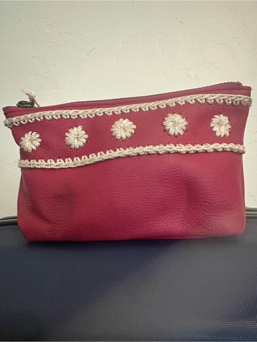 The Sak Pink Leather Cosmetic Pouch with Cream Crochet Trim